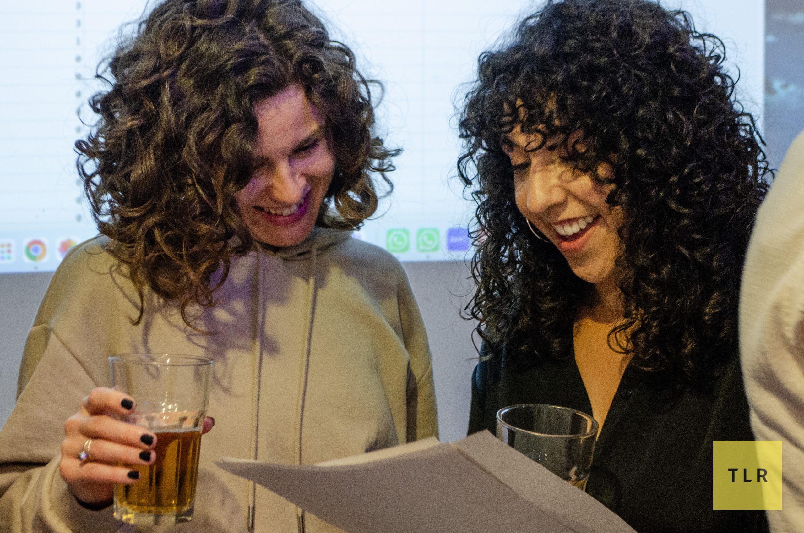 TLR Family member Dora and our friend Anais checking out the handy additional resources Joanna handed out during her talk. Pic: Adriana Catalina Marijuan Rodriguez 