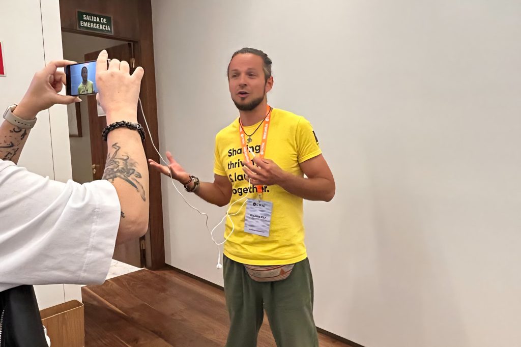 Ben being interviewed at the 2025 Coworking Spain conference. 